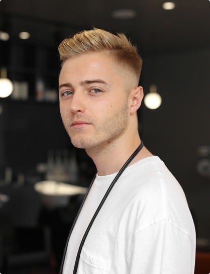 Classic men’s haircut with a natural finish created in a hair salon in Warsaw