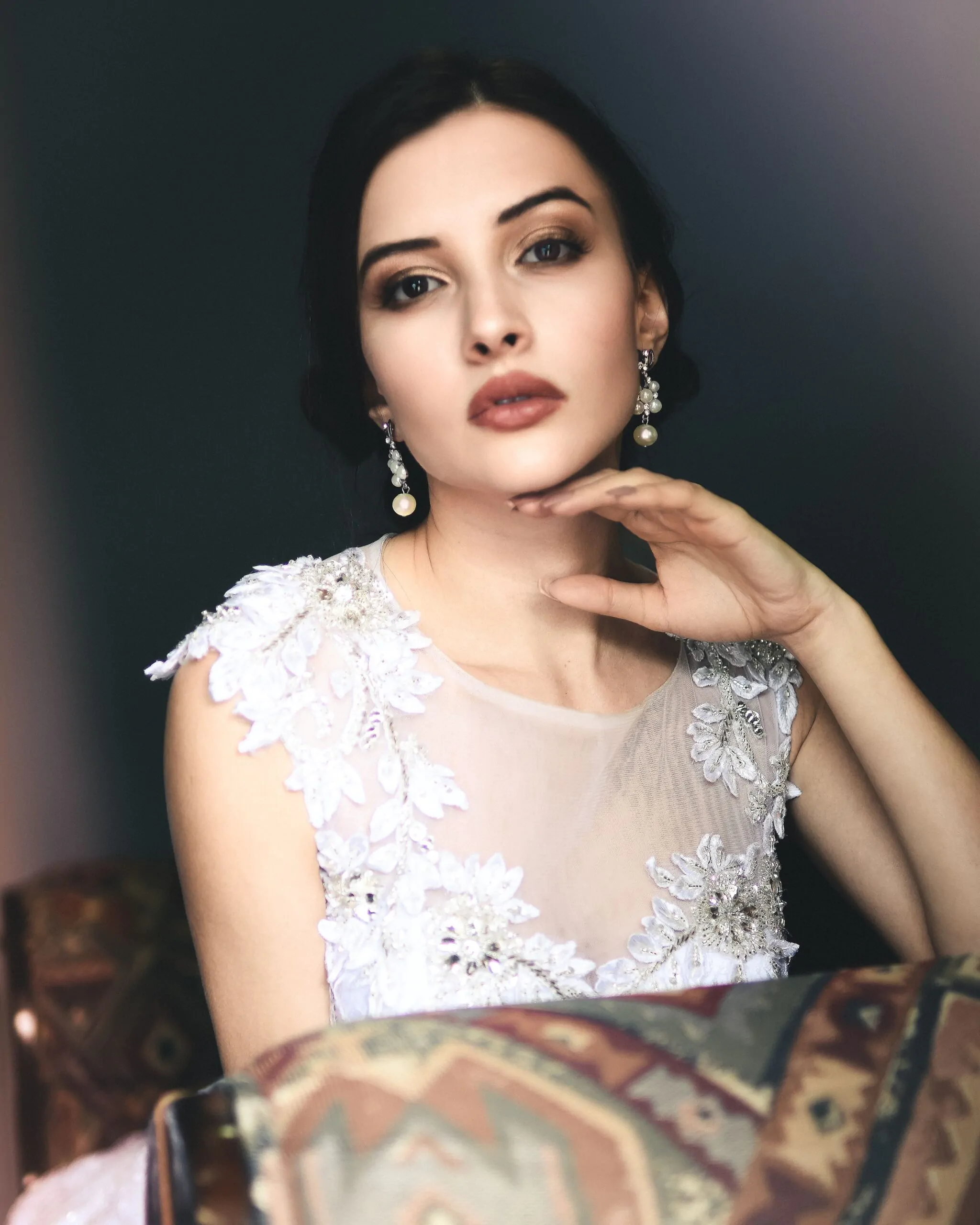 Delicate bridal glam featuring shimmering eyeshadow and a soft blush